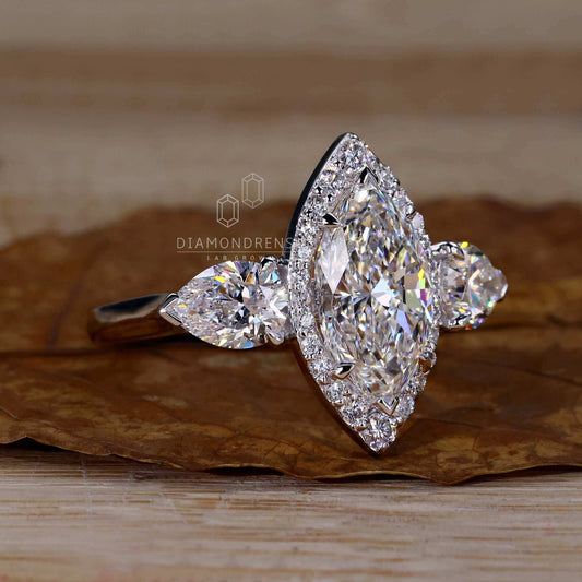 Marquise and Pear Cut Lab Grown Diamond Three Stone Engagement Ring