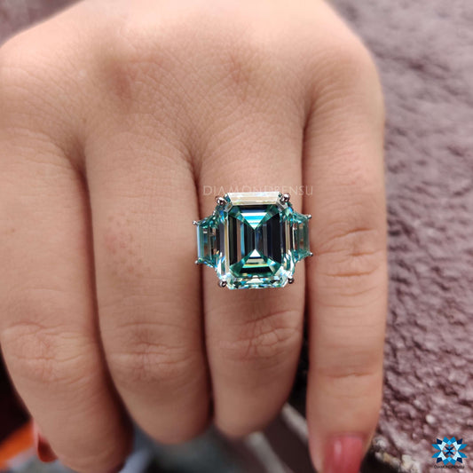 Unique 11.19 TW Emerald Cut and Trapezoid Cut Cyan Blue Three Stone Engagement Ring